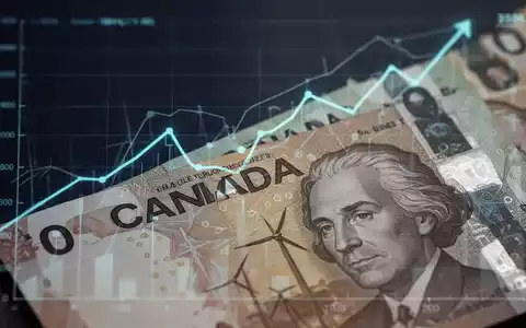 Nahaufnahme von kanadischen Dollar-Banknoten mit einem subtilen aufsteigenden Diagramm im Hintergrund, das finanzielles Wachstum darstellt. - Foto: über boerse-global.de