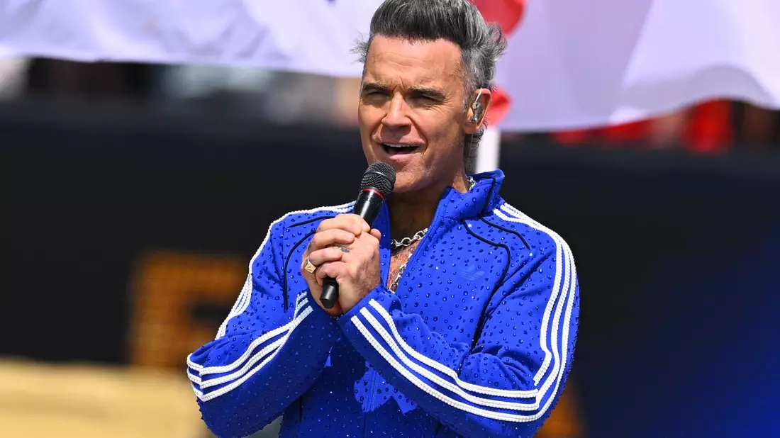Popikone Robbie Williams zeigte sich als großer Klopp-Fan.  - Bild: Tom Weller/dpa