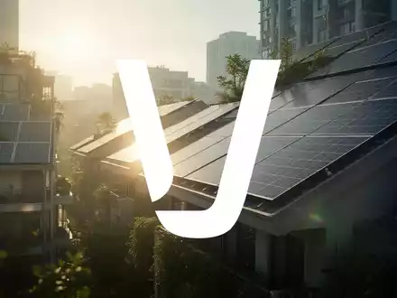 Solarpanels auf Dächern von Gebäuden in einer urbanen Umgebung, die Nachhaltigkeit und Wachstum symbolisieren. - Foto: über boerse-global.de
