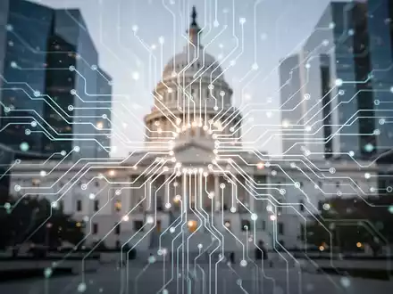 Eine futuristische Darstellung digitaler Prozesse mit einem leuchtenden neuronalen Netz vor einem unscharfen Hintergrund von Regierungsgebäuden. - Foto: über boerse-global.de