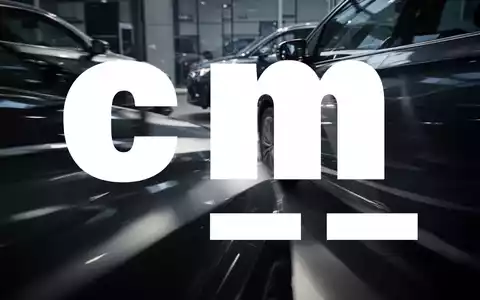 Eine dynamische, abstrakte Szene, die den Automobil-Einzelhandel darstellt, mit Fokus auf Licht, Schatten und Bewegung. - Foto: über boerse-global.de