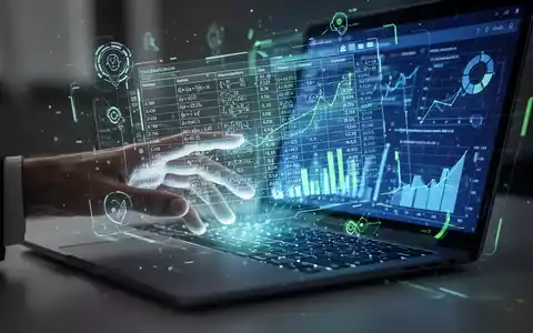 Eine Hand interagiert mit einem holografischen Tabellenblatt, das von einem Laptop projiziert wird und komplexe Daten sowie Formeln mit digitalen Schnittstellenelementen zeigt. - Foto: über boerse-global.de