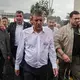 Özel führt im strömenden Regen einen Protestmarsch an. (Archivbild) - Bild: Ugur Yildirim/Dia Photo/AP/dpa