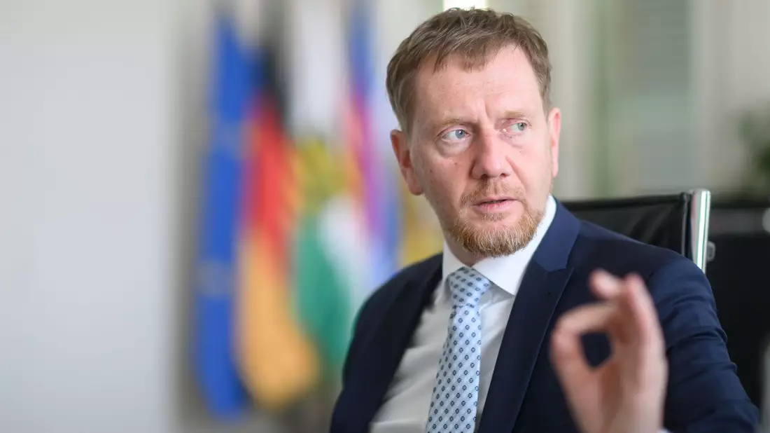 Sachsens Ministerpräsident Kretschmer sagt: «Wir müssen mit jedem reden, der reden will.» - Bild: Robert Michael/dpa