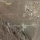 Die iranische Urananreicherungsanlage in Natans (r) und die im Bau befindliche Anlage, die als «Pickaxe Mountain» bekannt ist, südlich davon.  - Bild: Planet Labs PBC/Planet Labs PBC via AP/dpa
