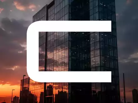 Abstrakte Darstellung eines modernen Versicherungsgebäudes bei dramatischem Sonnenuntergang. - Foto: über boerse-global.de