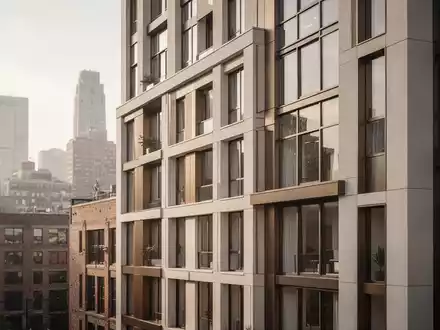 Moderne Architektur bei der Umwandlung eines Bürogebäudes in Wohnraum in einem städtischen Umfeld. - Foto: über boerse-global.de