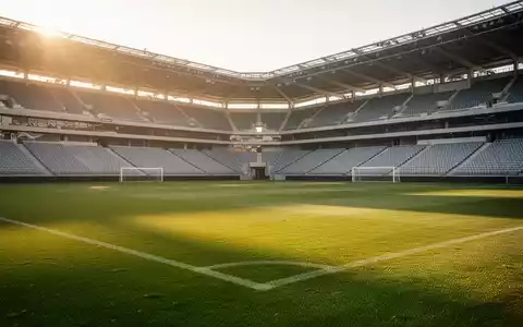 Ein sonnendurchflutetes, leeres Fußballstadion bei Tag, das eine einladende und inklusive Atmosphäre vermittelt. - Foto: über boerse-global.de