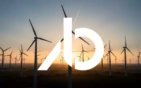 Moderne Windkraftanlagen vor einem dramatischen Sonnenuntergang, symbolisch für die Erneuerbare-Energien-Branche. - Foto: über boerse-global.de