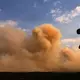 Wegen der Waldbrände in Spanien ist Rauch zu sehen. - Bild: Manu Fernandez/AP/dpa