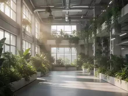Moderne, nachhaltige Industrieanlage mit integrierten Pflanzen und hellem Tageslicht als Symbol für ökologische Innovation. - Foto: über boerse-global.de