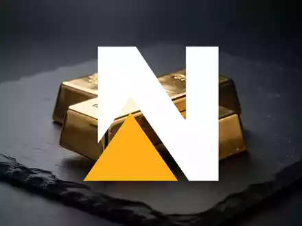 Ein glänzender Goldbarren auf dunklem Schieferhintergrund als Symbol für den Goldmarkt. - Foto: über boerse-global.de