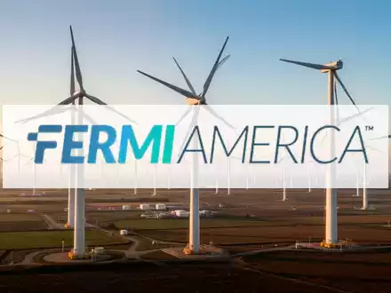 Moderne Windkraftanlagen in einer weiten Landschaft bei goldenem Licht als Symbol für erneuerbare Energien. - Foto: über boerse-global.de
