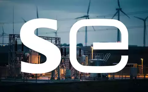 Abstrakte Darstellung einer modernen Energieinfrastruktur mit Windkraftanlagen bei Dämmerung. - Foto: über boerse-global.de