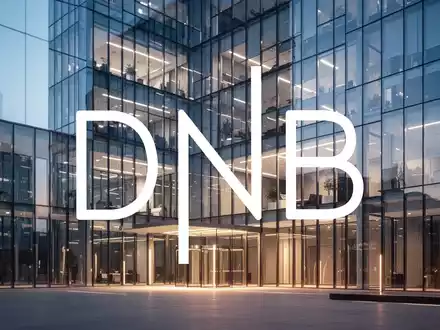 Abstrakte Darstellung eines modernen Bürogebäudes in der Abenddämmerung als Symbol für den Bankensektor. - Foto: über boerse-global.de