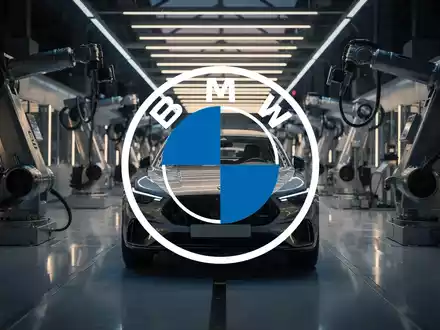 Abstrakte Darstellung einer modernen Automobilfertigungslinie in stimmungsvollem Licht für einen Finanzartikel. - Foto: über boerse-global.de