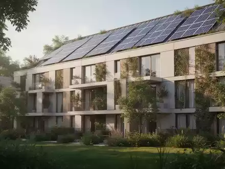 Modernes, nachhaltiges Wohngebäude mit integrierten Solaranlagen und begrüntem Umfeld bei Tageslicht. - Foto: über boerse-global.de