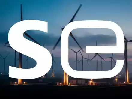 Moderne Windkraftanlagen in einer atmosphärischen Dämmerung als Symbol für die Energiebranche. - Foto: über boerse-global.de