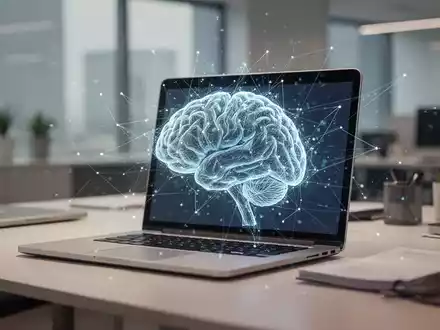 Ein moderner Büroarbeitsplatz mit einem Laptop und einer abstrakten digitalen Darstellung eines Gehirn-Netzwerks. - Foto: über boerse-global.de