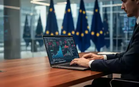 Moderne Büroatmosphäre mit Laptop-Arbeitsplatz und angedeuteten EU-Flaggen im Hintergrund. - Foto: über boerse-global.de