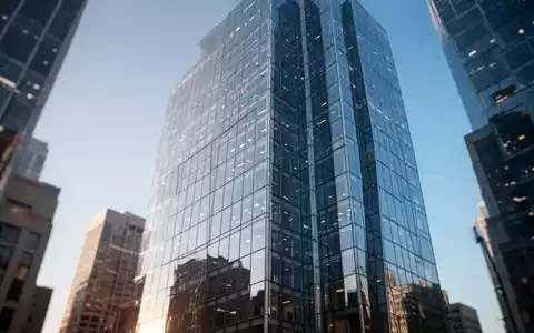 Ein modernes Bürogebäude in einem Finanzviertel bei klarem Himmel. - Foto: über boerse-global.de