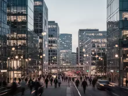 Moderne Büroarchitektur in einer deutschen Stadt bei Dämmerung, die den Arbeitsmarkt symbolisiert. - Foto: über boerse-global.de