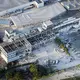 In einem schwer beschädigten Einkaufszentrum galten noch mehrere Menschen als vermisst.  - Bild: kyodo/dpa