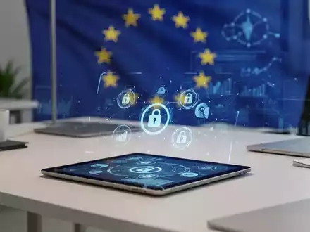 Ein modernes Büro mit einem Tablet, das Datensicherheits-Symbole anzeigt, vor einem dezenten Hintergrund mit EU-Motiv. - Foto: über boerse-global.de
