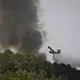 23 Löschflugzeuge sind in der Waldbrandregion im Einsatz. - Bild: Emma Da Silva/AP/dpa