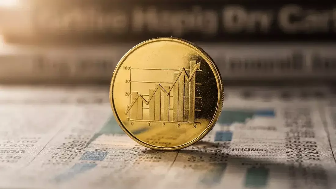 Gold Prices Slide as Fed Rate Hike Expectations and Strong Dollar Weigh
