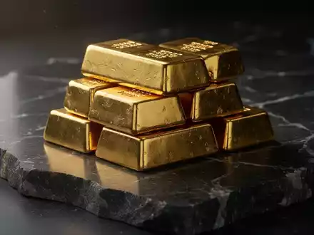 Goldbarren auf dunklem Untergrund als Symbol für den ghanaischen Goldmarkt - Foto: über boerse-global.de