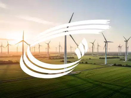 Moderne Windkraftanlagen in einer sonnendurchfluteten Landschaft, die für Erneuerbare Energien und wirtschaftliches Wachstum stehen. - Foto: über boerse-global.de