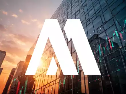 Moderne Glasfassade eines Hochhauses im Sonnenaufgang, die finanzielles Wachstum und Erfolg symbolisiert. - Foto: über boerse-global.de