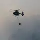 Drei Hubschrauber sind im Einsatz. - Bild: Uwe Lein/dpa