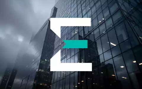 Abstrakte Darstellung einer modernen Bürofassade in kühlem Licht als Symbol für wirtschaftliche Unsicherheit. - Foto: über boerse-global.de