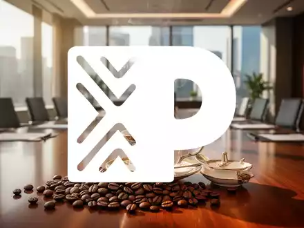 Hochwertige Kaffeetasse in einem modernen Konferenzraum als Symbol für eine Unternehmensübernahme. - Foto: über boerse-global.de
