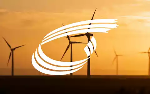 Moderne Windkraftanlagen in einer weiten Landschaft bei Sonnenuntergang als Symbol für den Energiesektor. - Foto: über boerse-global.de