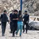 Marokkanische Sicherheitskräfte nahmen Menschen fest.  - Bild: Stringer/AP/dpa
