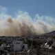 Von Athen aus sind die Rauchwolken der Brände westlich der griechischen Hauptstadt zu sehen. - Bild: Lefteris Partsalis/XinHua/dpa