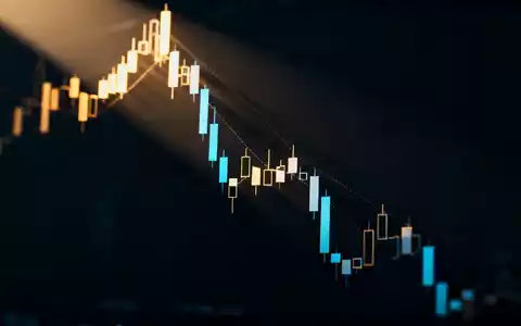 Abstrakte Darstellung eines volatilen Finanzmarktes mit fallenden digitalen Strukturen und düsterer Lichtstimmung. - Foto: über boerse-global.de