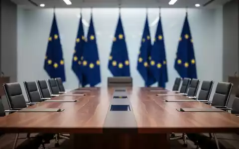 Ein moderner Konferenzraum mit EU-Flaggen im Hintergrund als Symbol für diplomatische Verhandlungen zur Migrationspolitik. - Foto: über boerse-global.de