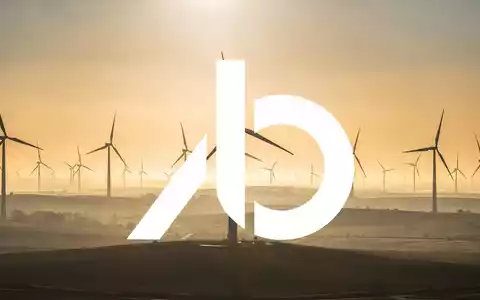 Moderne Windkraftanlage im goldenen Sonnenaufgang als Symbol für erneuerbare Energien und Finanzierungslösungen. - Foto: über boerse-global.de