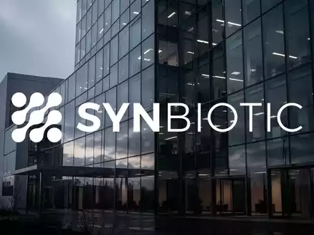 Ein modernes, minimalistisches Bürogebäude in der Dämmerung, das eine Atmosphäre wirtschaftlicher Vorsicht vermittelt. - Foto: über boerse-global.de