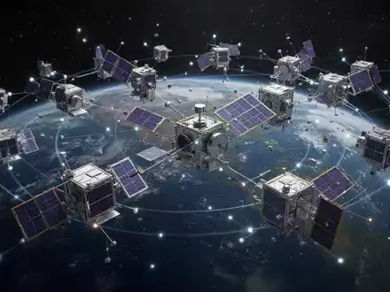 Mehrere kleine Satelliten im Erdorbit vor dem dunklen Weltraum. - Foto: über boerse-global.de