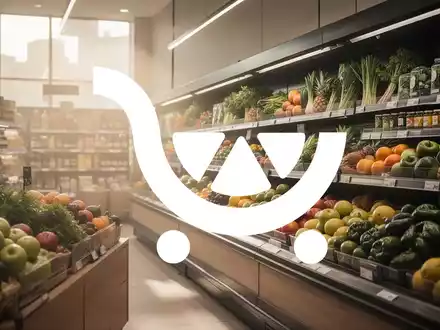 Moderne, aufgeräumte Supermarkt-Gänge mit weichem Licht und frischen Lebensmitteln in einer professionellen Atmosphäre. - Foto: über boerse-global.de