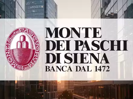 Moderne Glasarchitektur im Finanzviertel bei Dämmerung, symbolisiert strategische Konsolidierung und Bankenwesen. - Foto: über boerse-global.de