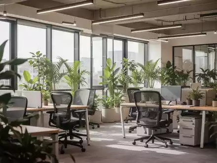 Moderner, ergonomisch gestalteter Coworking-Arbeitsplatz mit viel Tageslicht und Pflanzen in einem Bürogebäude. - Foto: über boerse-global.de
