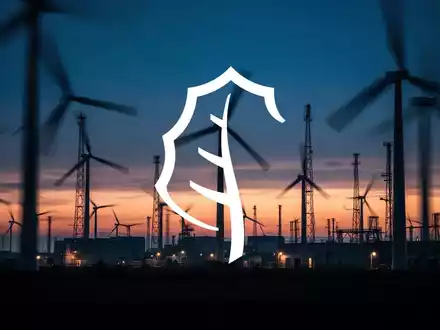 Dämmerungsaufnahme eines modernen Windparks mit stimmungsvoller Beleuchtung. - Foto: über boerse-global.de