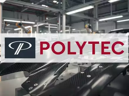 Abstrakte Darstellung einer modernen industriellen Fertigungshalle mit Fokus auf Präzisionstechnik. - Foto: über boerse-global.de