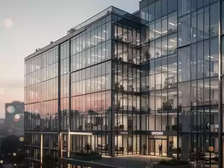 Modernes Bürogebäude der Ovag-Gruppe bei Dämmerung als Symbol für Unternehmensführung und rechtliche Aufsicht. - Foto: über boerse-global.de